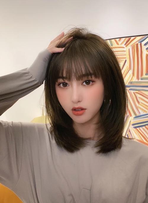 各种女发型图片大全_短发利落个性 适合通勤